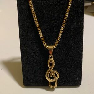 Elegant Gold Treble Clef Necklace